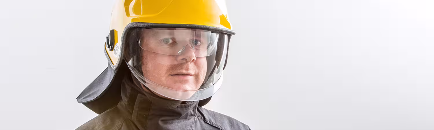 Person wearing yellow helmet, Model F10 MKV from Pacific Helmets Lakeland