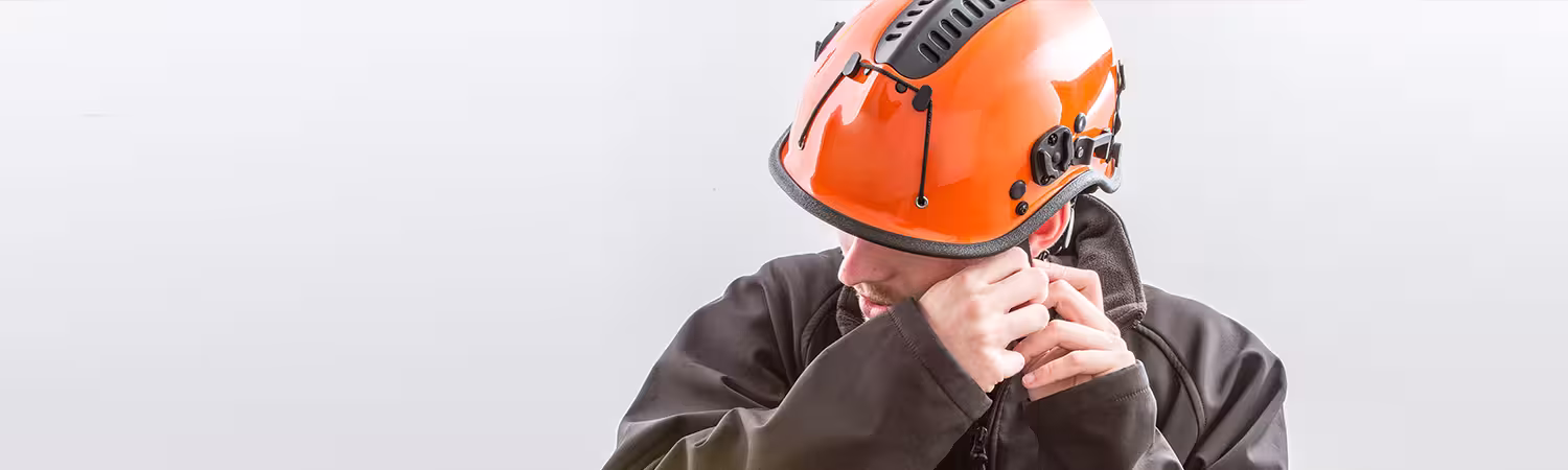 Person wearing orange helmet, model R6V from Pacific Helmets Lakeland