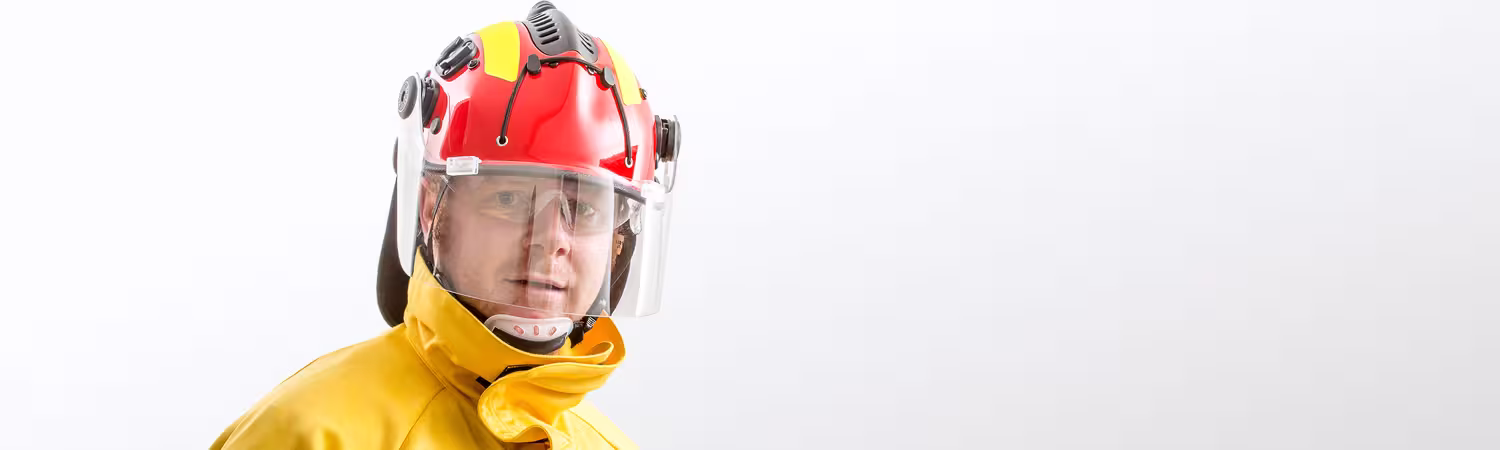 Person wearing a red helmet, Model R6V from Pacific Helmets Lakeland